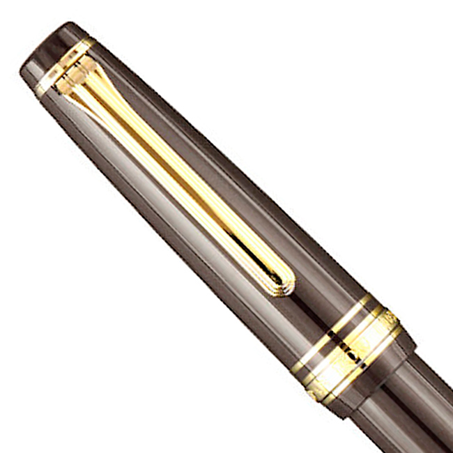 Tanned color and golden trim in the cap of the Slim Mini Puff Brown